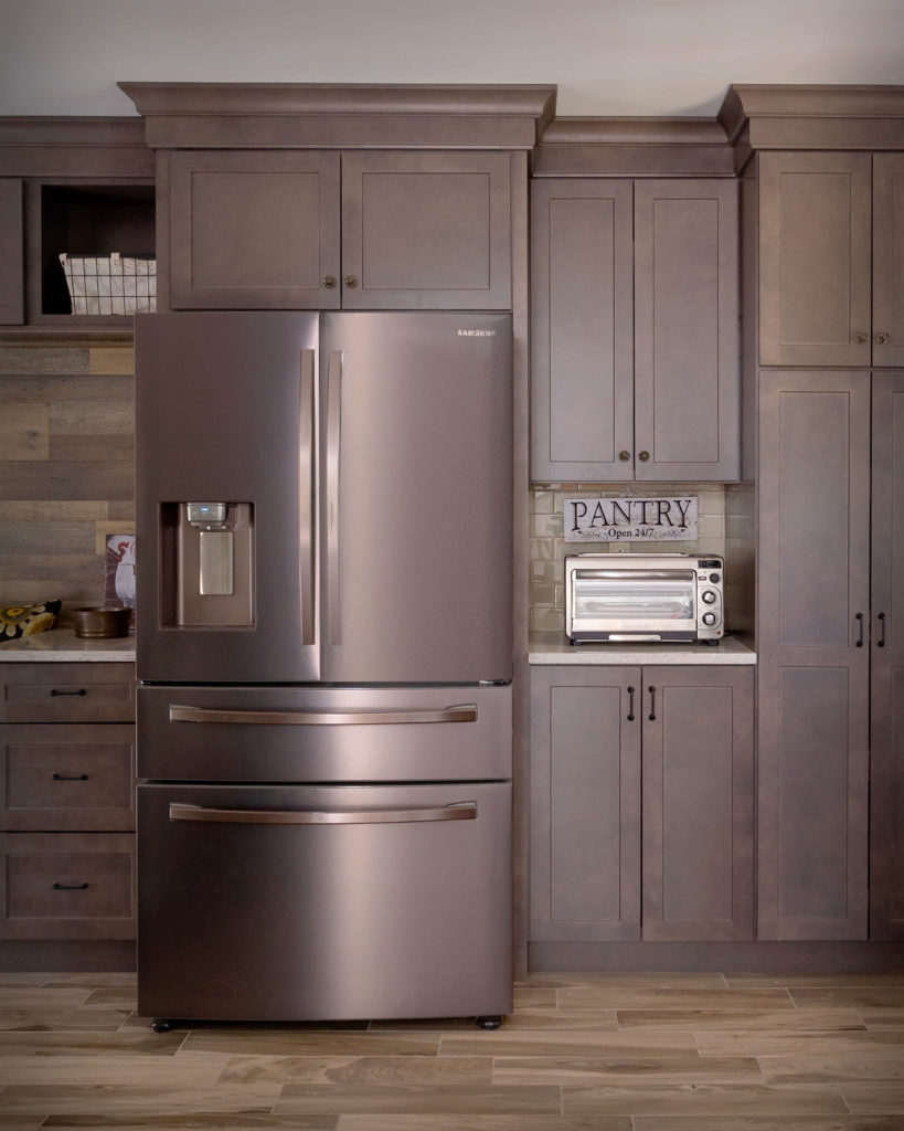 South Windsor kitchen remodel boot bench continues to fridge tall utility cabinet and upper and lower cabinet storage