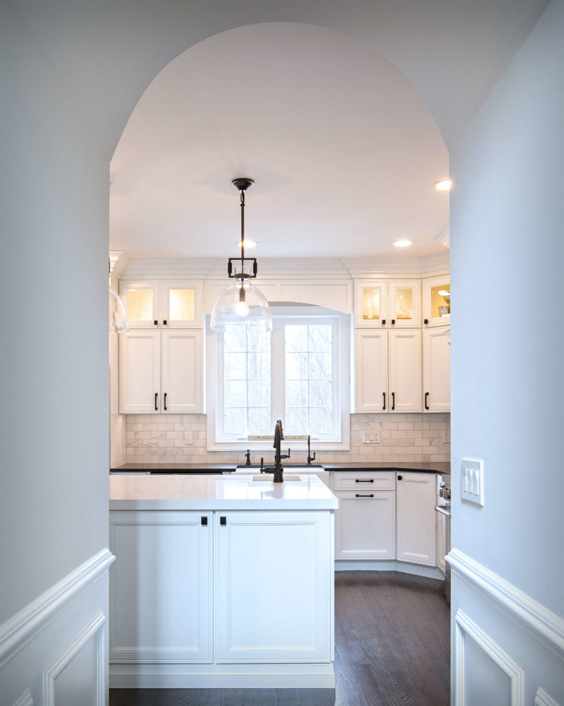 Farmhouse modern kitchen remodel view from the main hallway entrance.