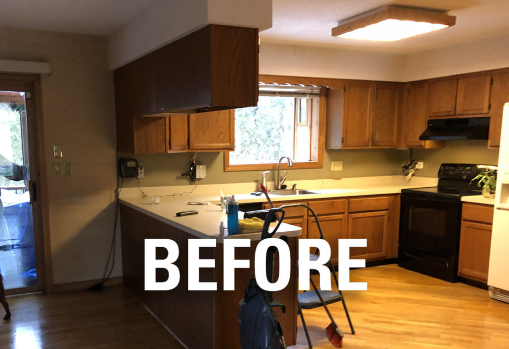 View of the island and perimeter cabinets BEFORE work on this kitchen remodel in Wallingford, CT.